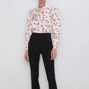 Floral blouse with epaulettes